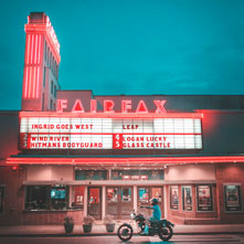 Fairfax Theater marquee and neon lights at night