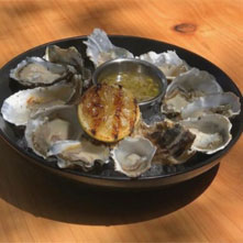 round tray of a dozen oysters from Stillwater restaurant in Fairfax